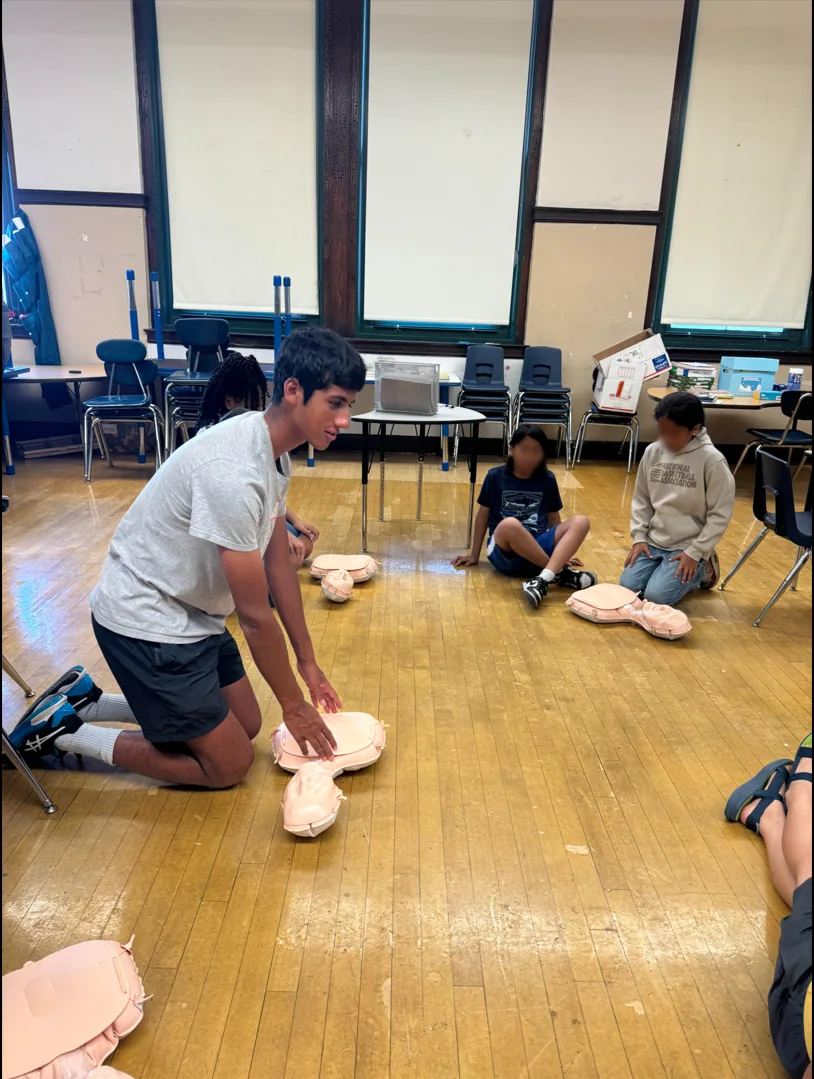 Jay Manadan teaching a hands-only CPR session